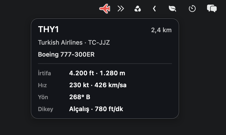 The THY1 flight card under the red aircraft in the menu bar. Turkish Airlines, TC-JJZ, Boeing 777-300ER, 2.4 km, plus altitude, speed, heading, and descent.